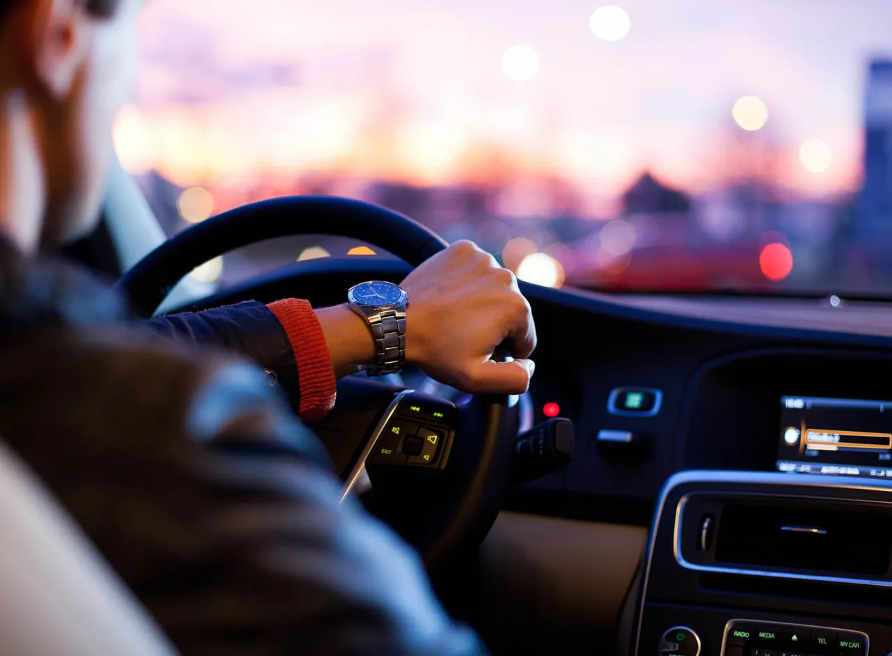 car dashboard at sunset